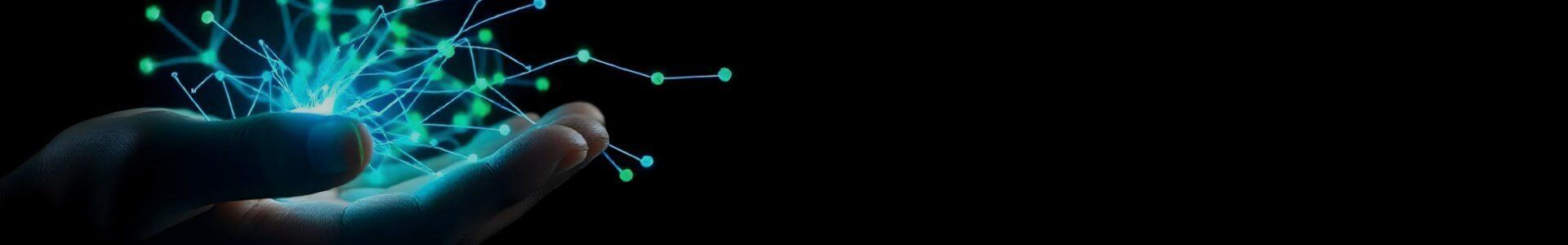 A human hand gently holds a glowing, interconnected network of blue and green light.