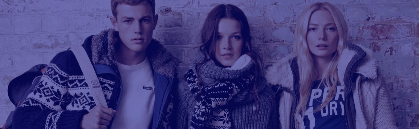 Three young models showcasing winter fashion in warm, stylish jackets and scarves.